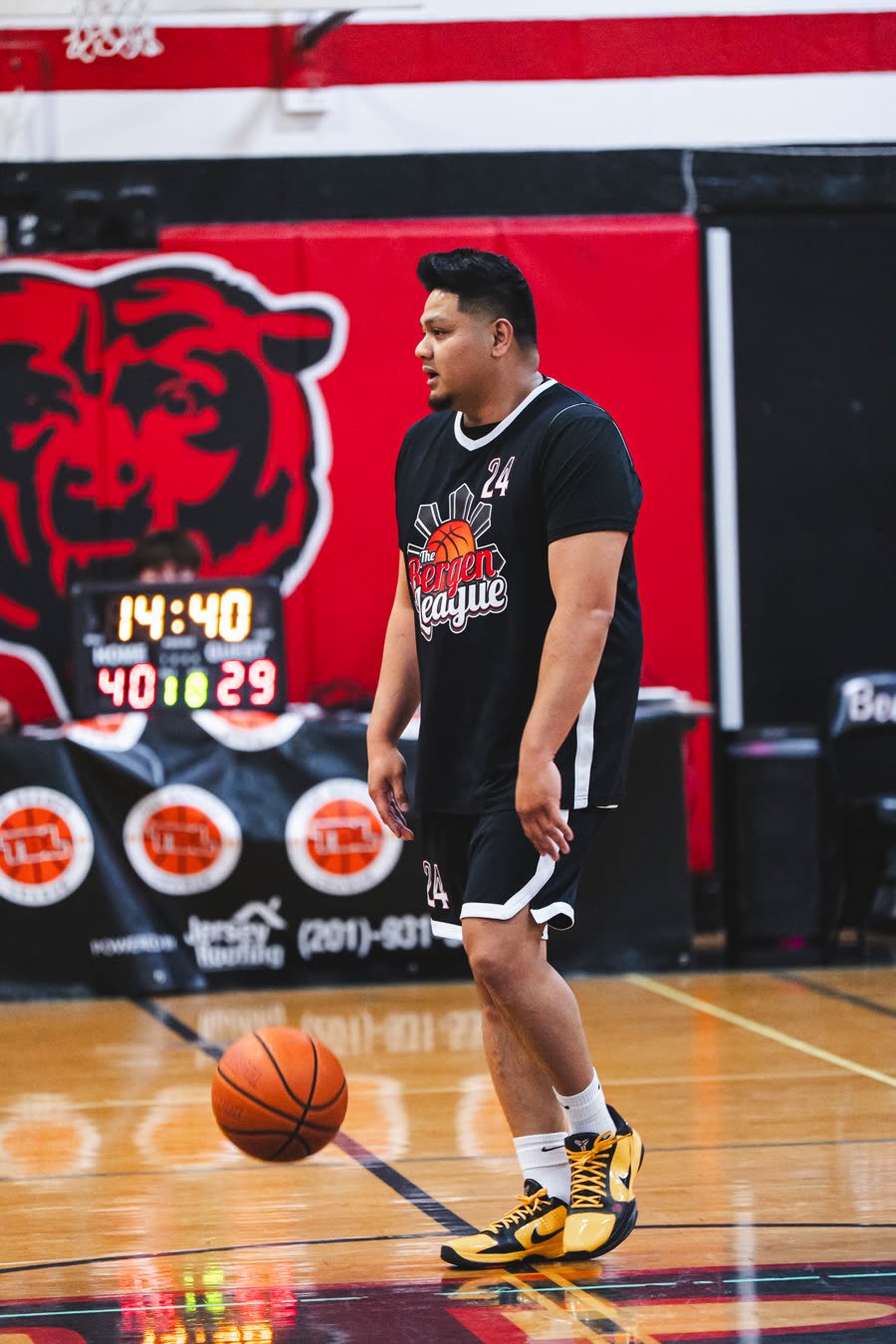 Player mid-game on the Bergen League court