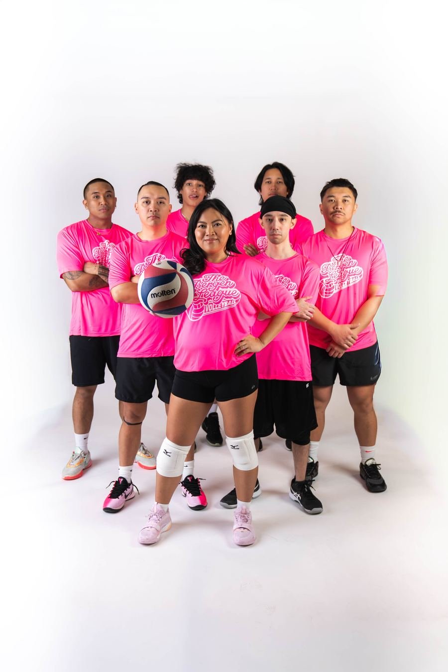 Team in pink jerseys, media day group shot