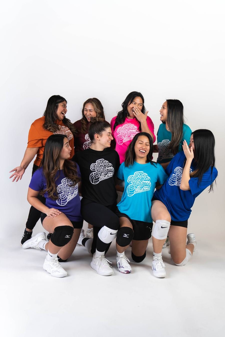 Volleyball players laughing on media day
