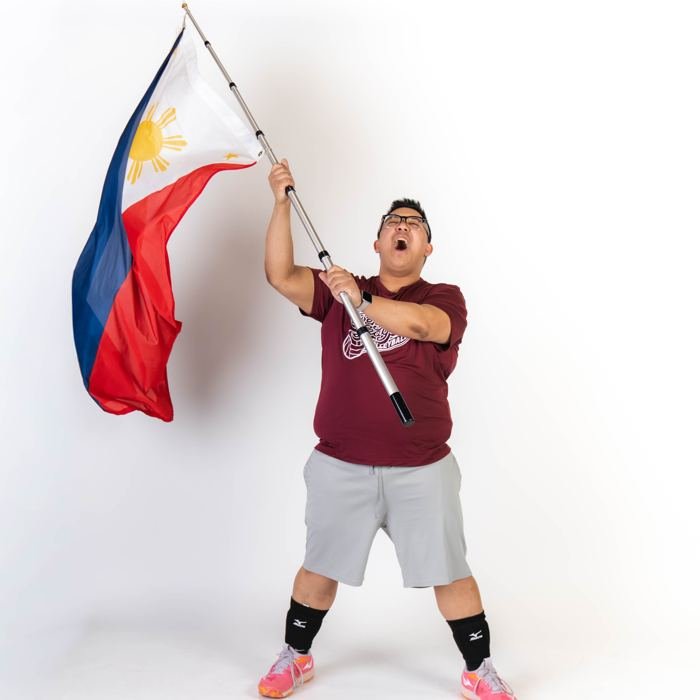 Media-day portrait with the Philippine flag